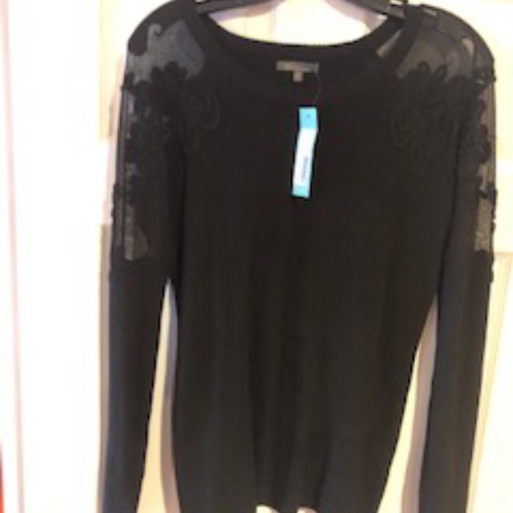 Lightweight black sweater with sheer shoulders